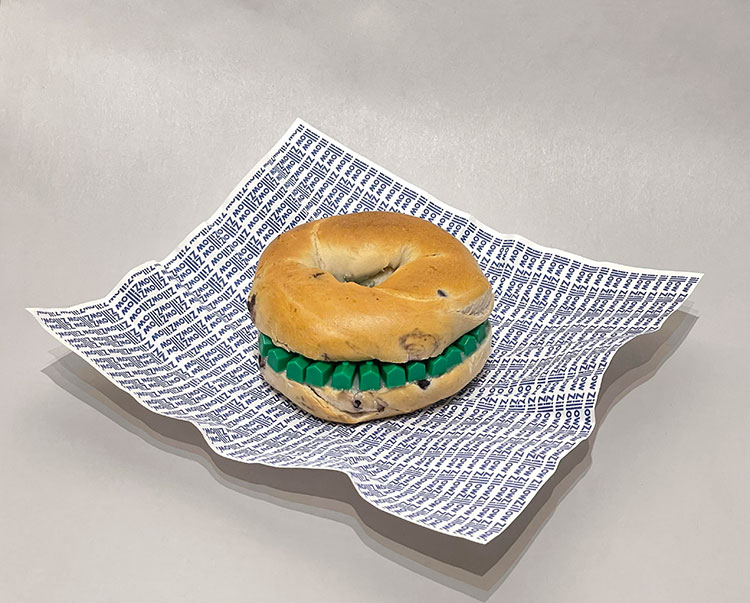 Heavy Meal is a 3D Sculpture created in 2022 using a real bagel and monopoly houses